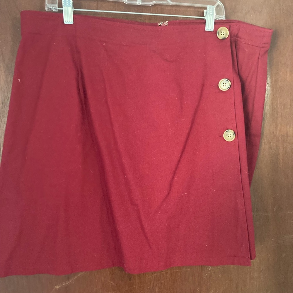 Darling cranberry red skirt with button detail